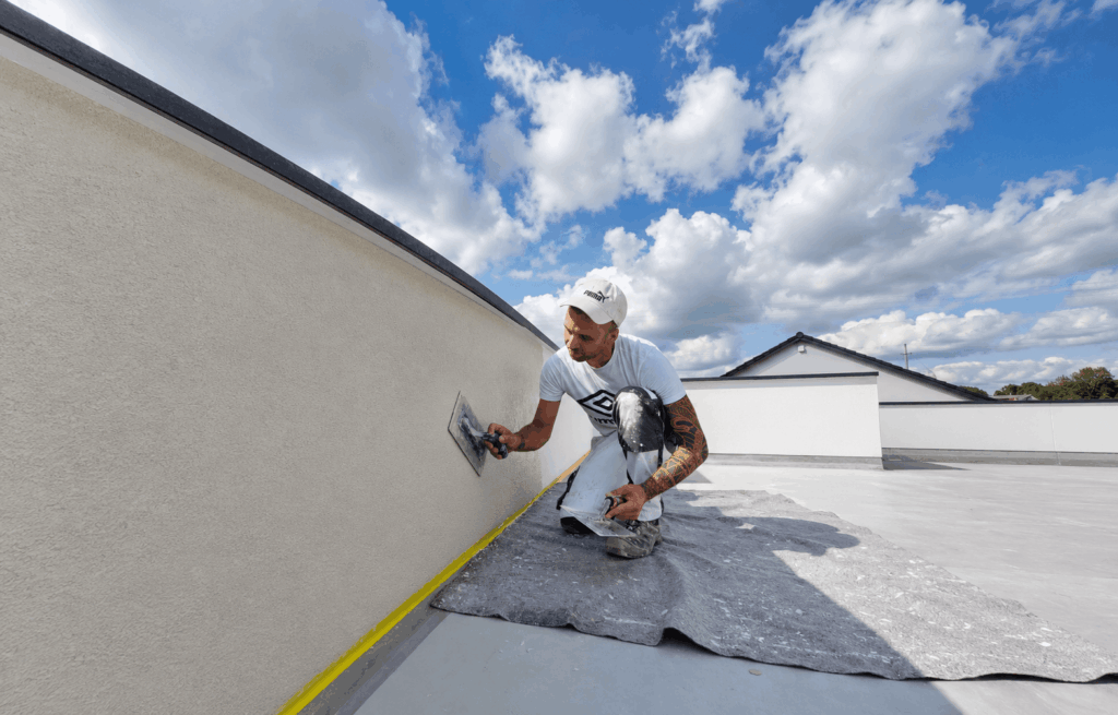 Neu verputzte Wohnhausfassade als Beispiel für Arbeiten von Gipser Graf